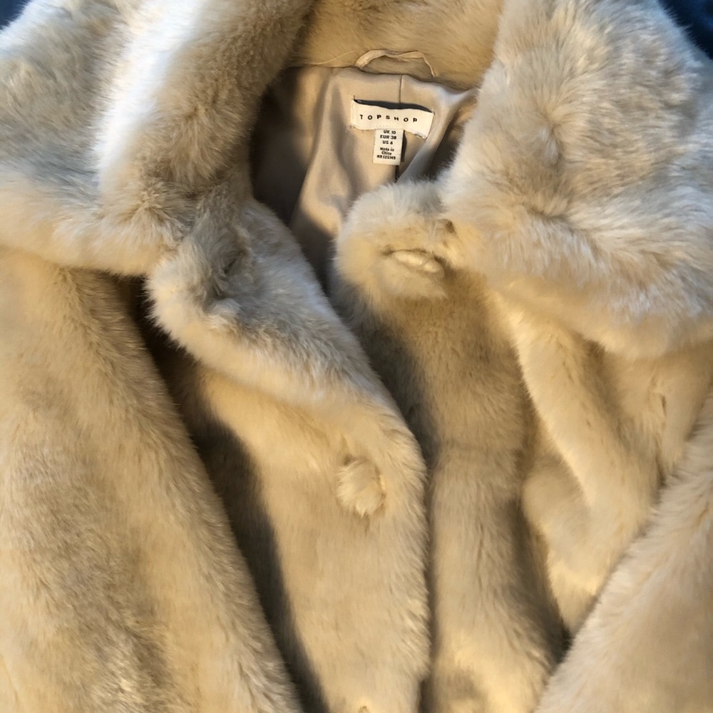 Classy white faux fur coat